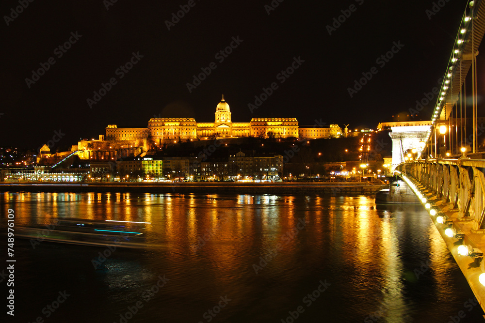 Famous Chain bridge Buda castle at night and river Danube in Budapest
