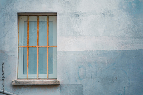 Clean Blue Plaster Wall with Window photo