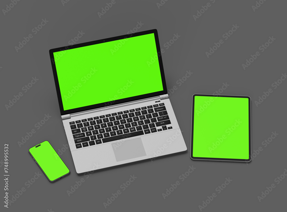 Mockup of laptop, tablet and smartphone on a grey background Mockup of laptop, tablet and smartphone on a grey background
