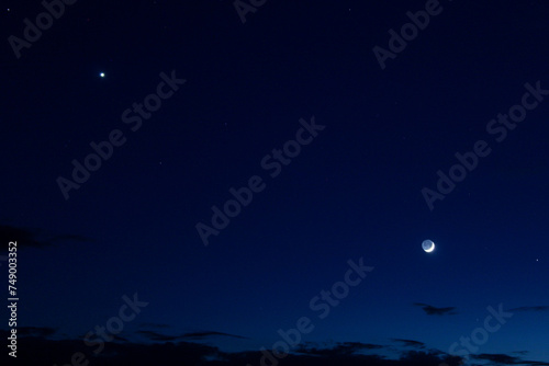 crescent moon, jupiter and venus in the sky