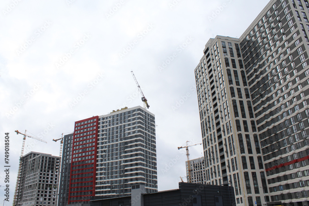Naklejka premium new tall buildings under construction in Kyiv Ukraine