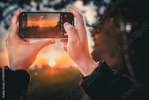person holding camera in hand
