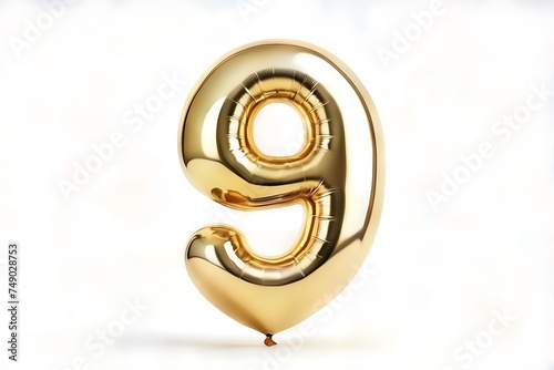 golden balloon shape for number 9 on white background, Golden number nine balloon shape for birthdays, parties and celebrations photo