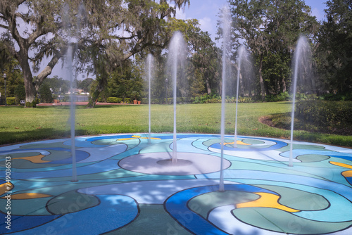 Fototapeta Naklejka Na Ścianę i Meble -  Splash pad in a park on sunny day