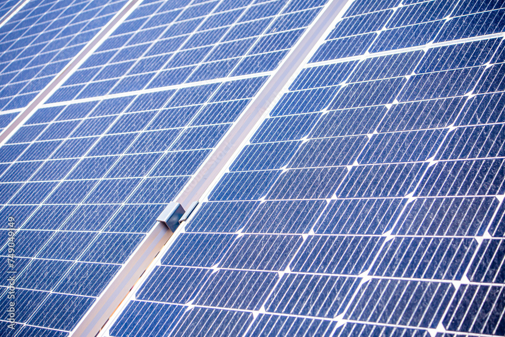 Close-up of solar panels installed in the desert to provide electricity to a remote meteorological base Close-up of solar panels installed in the desert to provide electricity to a remote meteorological base