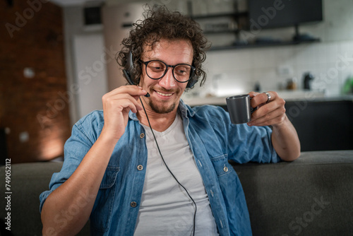 One man caucasian male freelancer work from home on laptop computer