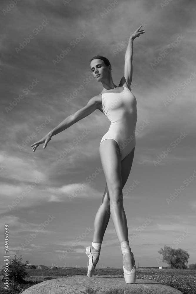 Obraz premium young slim woman ballerina in bodysuit