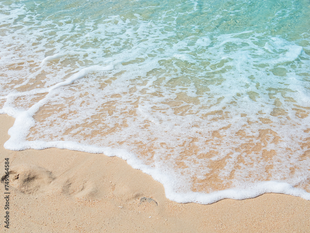 Travel Nature Concept, Sea Sand Background Blue Water at Coast Season Summer Tropical Ocean Beautiful Wave Seascape Vacation Smooth Wallpaper Island Outdoor Tropical Coast Sandy Nature Landscape.