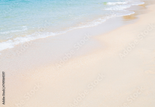 Travel Nature Concept, Sea Sand Background Blue Water at Coast Season Summer Tropical Ocean Beautiful Wave Seascape Vacation Smooth Wallpaper Island Outdoor Tropical Coast Sandy Nature Landscape.