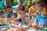 Young Children Engaged in Creative Play with Colorful Toys at Outdoor Activity Table in Bright Daylight