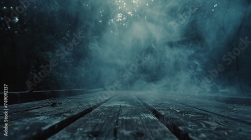 empty wooden table with smoke float up on dark background photo