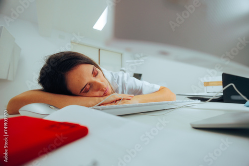 Tired Doctor Working Late on her Pc Computer Falling Asleep. Exhausted overworked medical worker restring during night shift
 photo