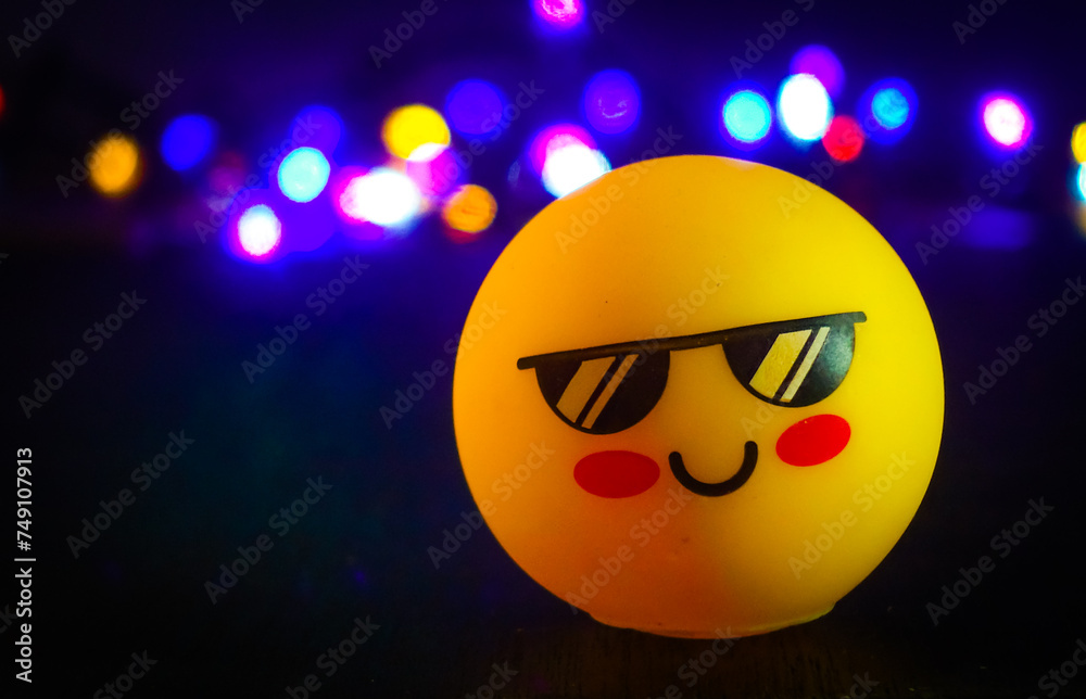 Yellow emoticon with bokeh background Yellow emoticon with bokeh background