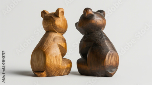 Hand made craft: A close-up and back view, a collection of two wooden polar bears/bears sitting together, isolated on white background, with nature and soft studio lighting...