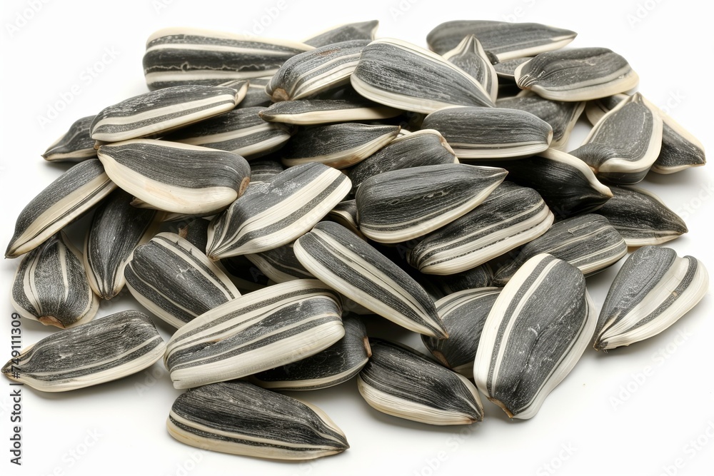 Sunflower seeds creative arrange on white background. Sunflower seeds creative arrange on white background.