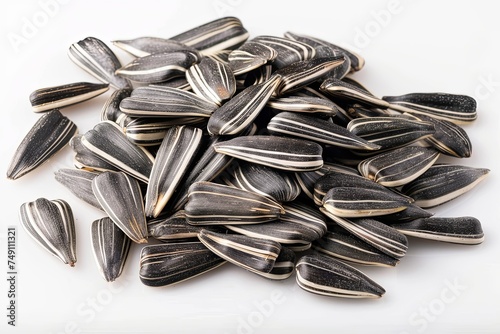 Sunflower seeds creative arrange on white background. photo