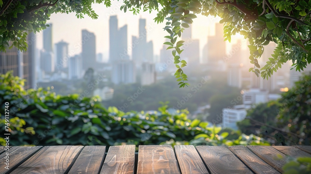 Wood table top on blur of window glass and abstract green from garden with city view in the morning background. Wood table top on blur of window glass and abstract green from garden with city view in the morning background.