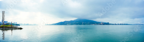 Taipei, Taiwan, Republic of China, 01 22 2024: Clean Tamsui river in a raining day in winter