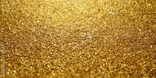 Gold texture. Golden background with effect metallic foil. Speckles gold material. Speckled glitter backdrop. Abstract shiny pattern. Shine metal plate for design