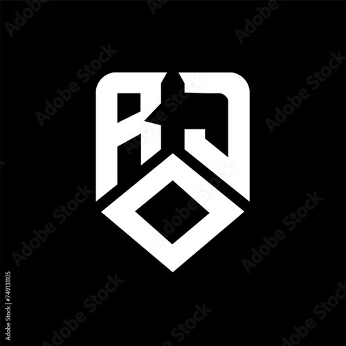 ROJ letter logo design on black background. ROJ creative initials letter logo concept. ROJ letter design.
 photo