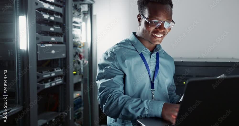 Black man, engineer and laptop in server room for database update, cyber security or coding. Computer, typing and happy technician in data center for information technology or programming software