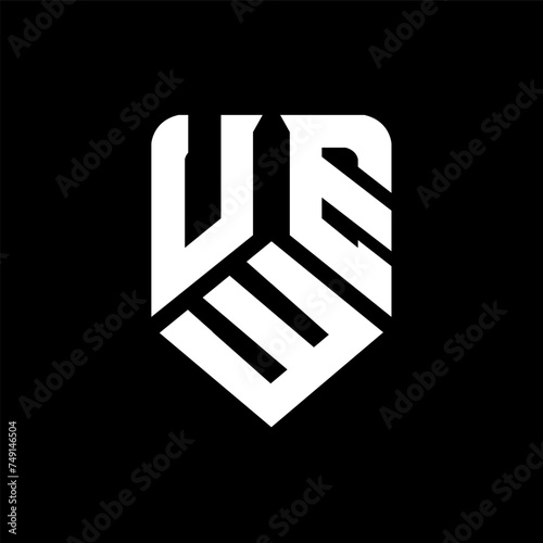 UWE letter logo design on black background. UWE creative initials letter logo concept. UWE letter design.
