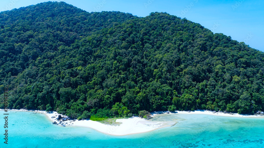 The aerial view of white sand beach tropical with seashore as the ...
