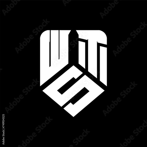WST letter logo design on black background. WST creative initials letter logo concept. WST letter design.
 photo