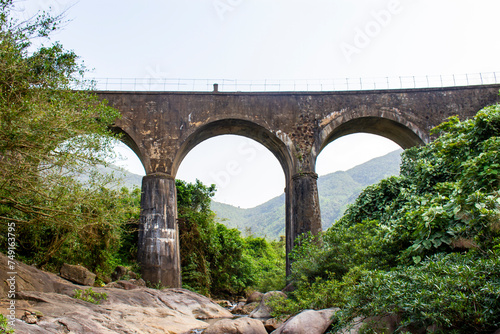 Don Ca Arch Bridge At Hai Van Pass, Vietnam. This Bridge Is A Part Of An Elevated Vietnam Railway Track With Beautiful Landscape. © Huy Nguyen