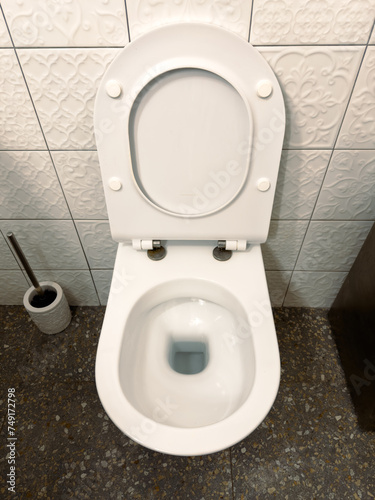 White toilet in the toilet room