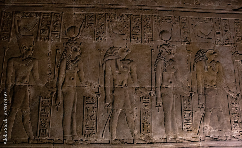 Ancient egyptian carvings and hieroglyphs at the temple of Horus in Edfu, Aswan, Egypt 