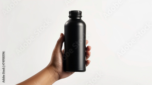 hand holding empty black tumbler bottle, clean white background, Ai generated Images 