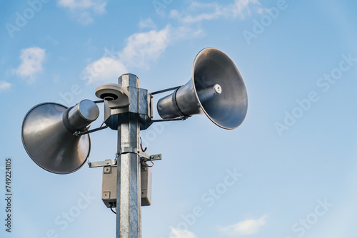 Loudspeakers on pole, broadcasting sound equipment