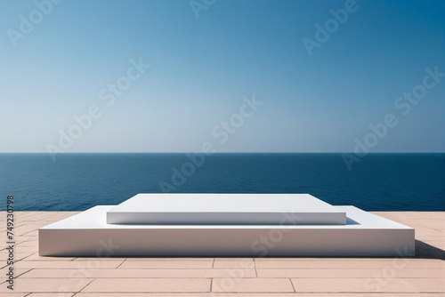 Abstract minimalist podium stage with square pedestals for product presentation against blue sky background and seas