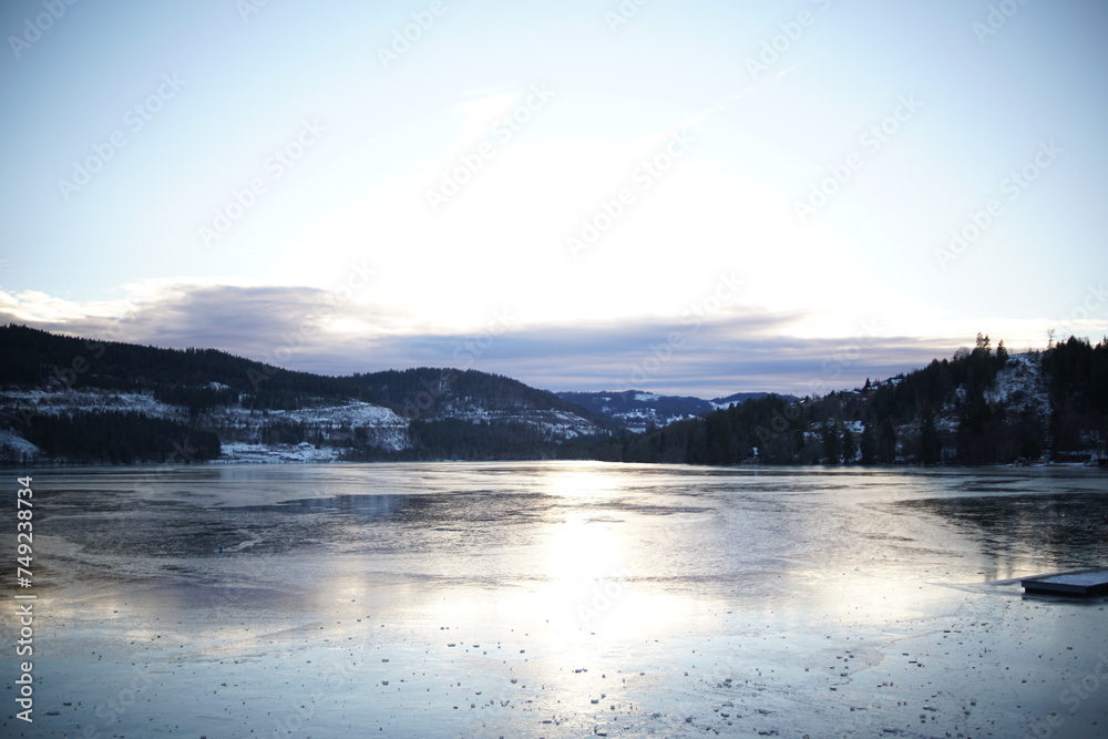 Partly frozen Titisee, the lake in Freiburg, Germany