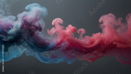 Colorful abstract red pink and blue smoke blends with black background in a beautiful explosion of hues, resembling clouds in a vibrant sky