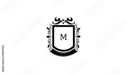 Illustration of a Shield With Crown Alphabetical Logo