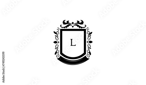 Illustration of a Shield With Crown Alphabetical Logo