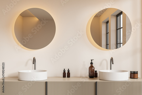Modern hotel bathroom interior with double sink and accessories on vanity