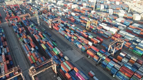 day View of Busan Port: Container Terminal Amidst Mountains and Sea