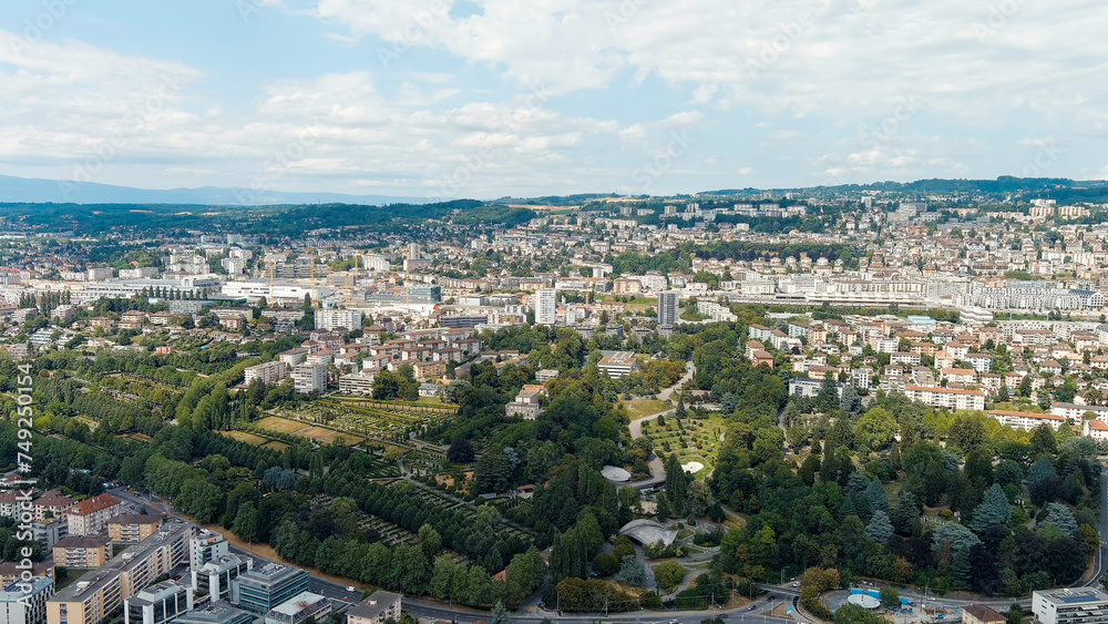 Lausanne, Switzerland. Panorama of the city and view of the Bois de Vaux Cemetery. Located on the shores of Lake Geneva. Summer day, Aerial View