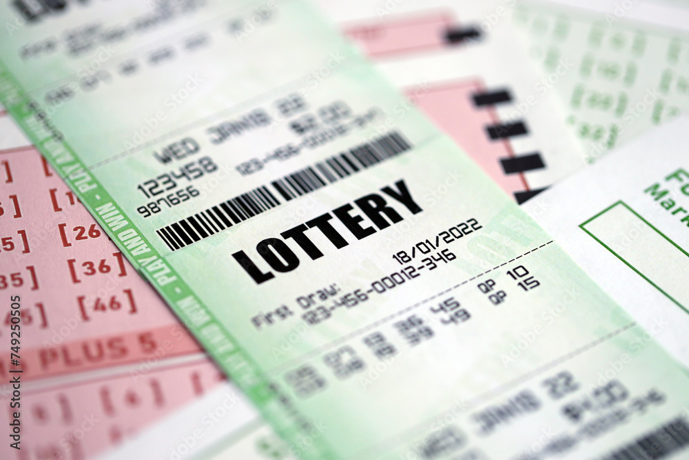 Green and red lottery tickets on blank bills with numbers for playing lottery close up Green and red lottery tickets on blank bills with numbers for playing lottery close up