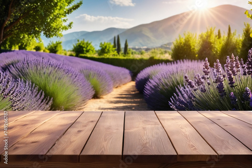 Empty wooden table for product display with lavender garden background