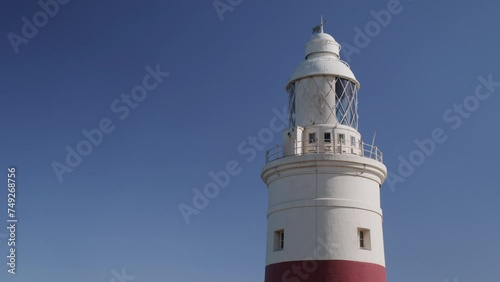 Europa Point Lighthouse at the Europa Point in Gibraltar with the Gibraltar strait in background