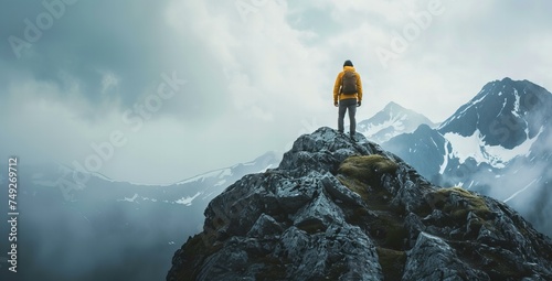 person on the top of the mountain