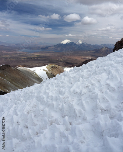 Climbing the Cerro Acotango, at border between Bolivia and Chile. 6052 meters high, with stunning views of the volcanoes Sajama and Parinacota photo