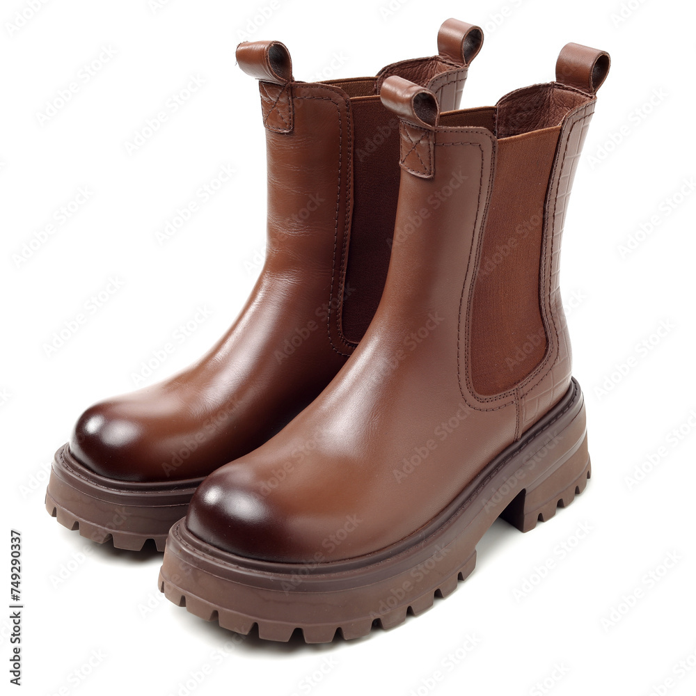Women leather brown boots on white background Women leather brown boots on white background