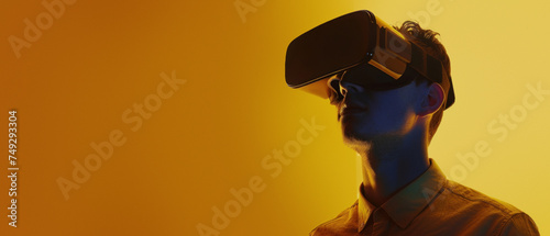 A pensive man engaging with cutting-edge virtual reality tech amidst warm golden hues, signifying innovation and curiosity