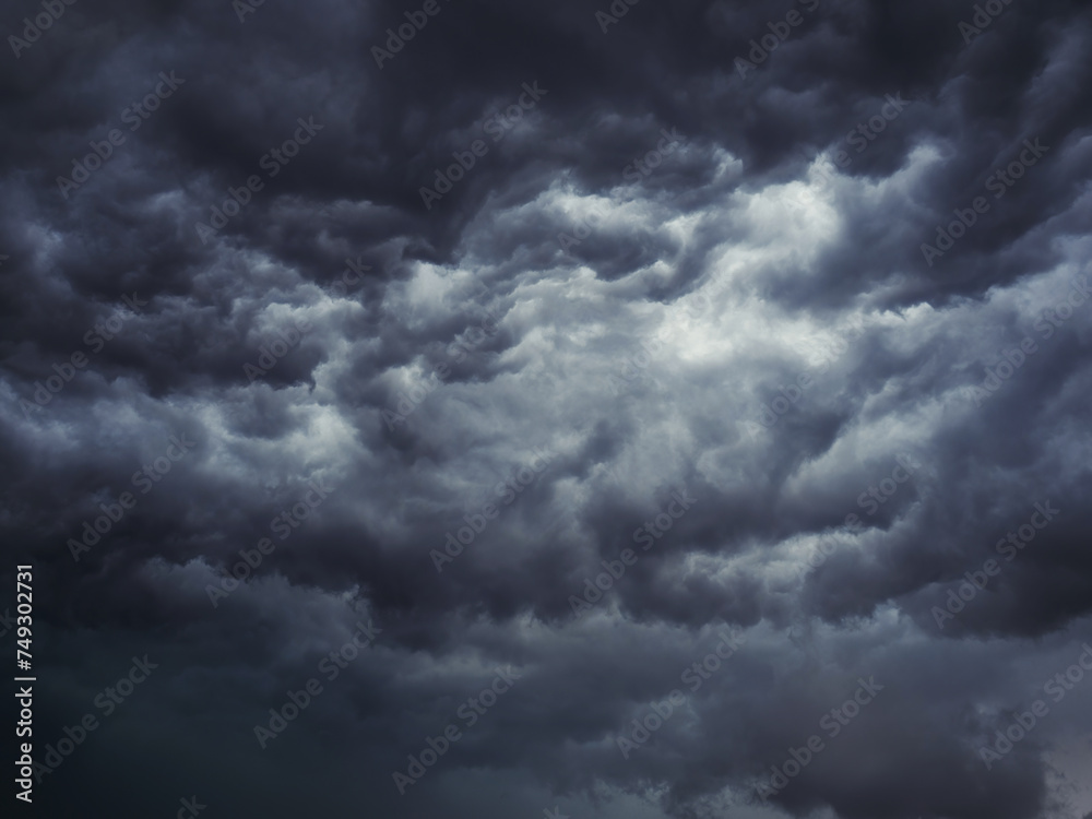 Dramatic blue sky with clouds. Spooky abstract background pattern texture. Horror, Halloween, evil, armagedon, apocalypse concept. - obrazy, fototapety, plakaty 