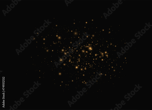  background effect of gold Dust particles that can be used for luxury greeting cards. The texture sparkles and creates a star dust explosion on a transparent background. 